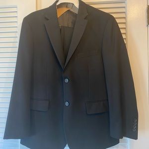 Men’s two piece  black suit modern fit. Flat front pant. Like new. Worn 2x
